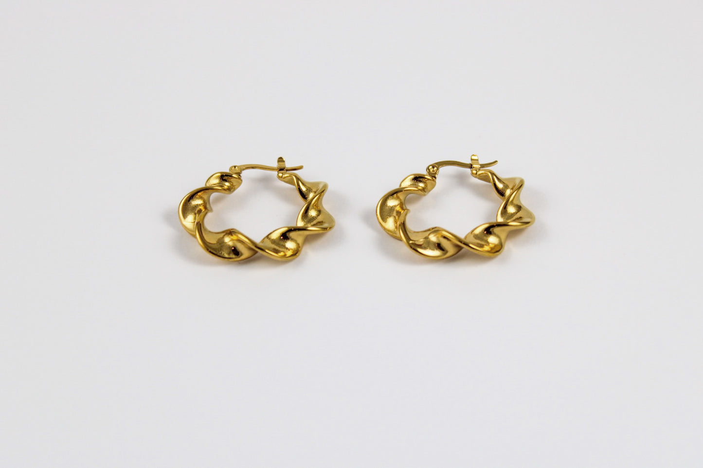 Large curl earrings