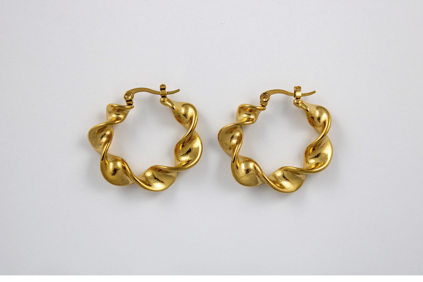 Large curl earrings