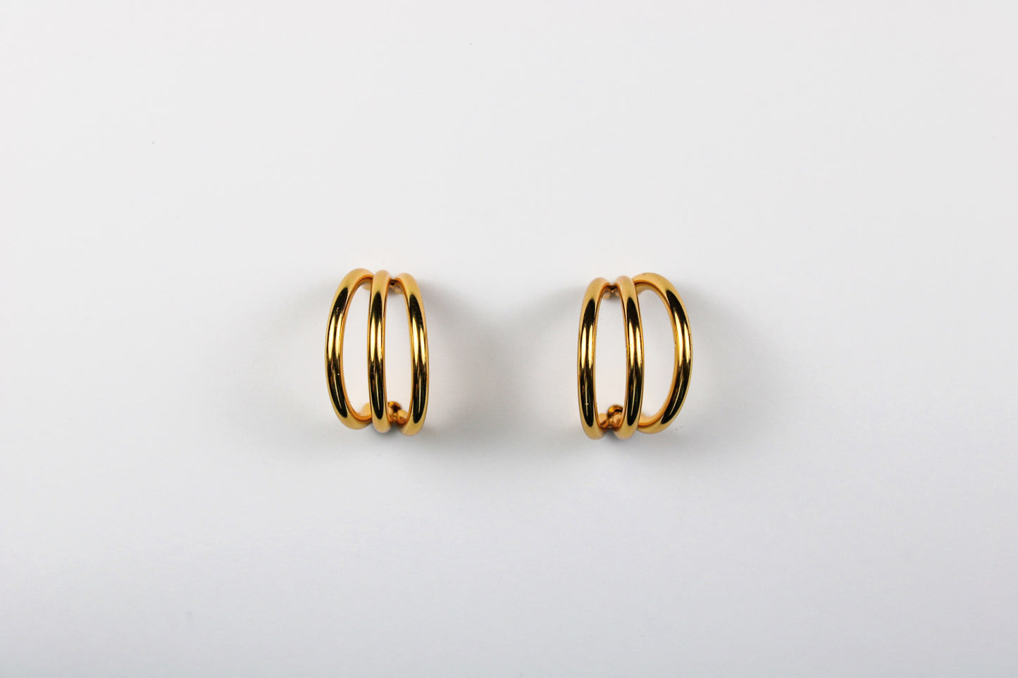 Triple smooth hoop earrings
