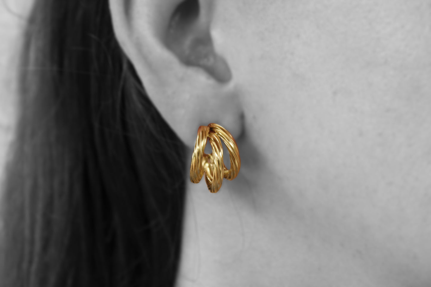 Triple twist hoop earrings