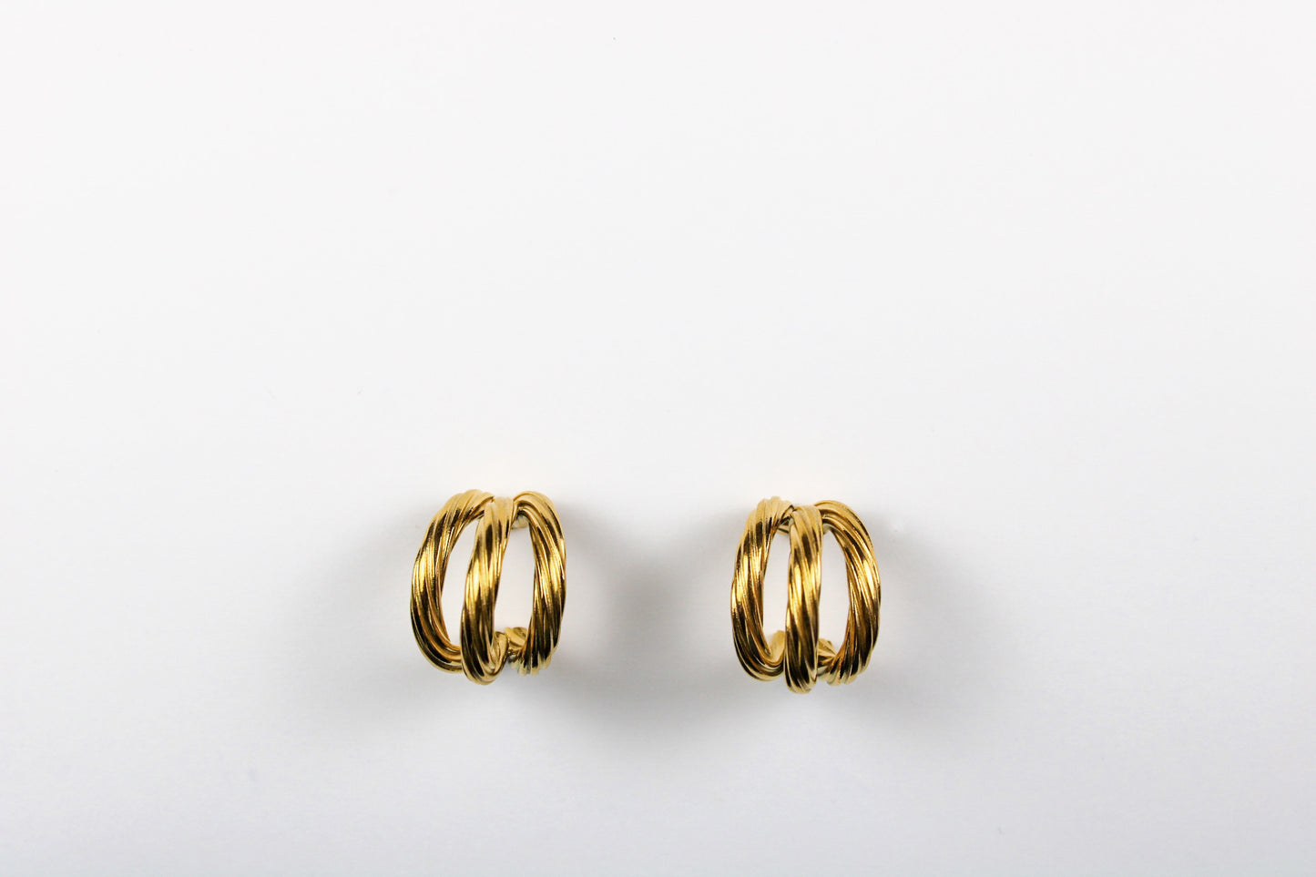 Triple twist hoop earrings