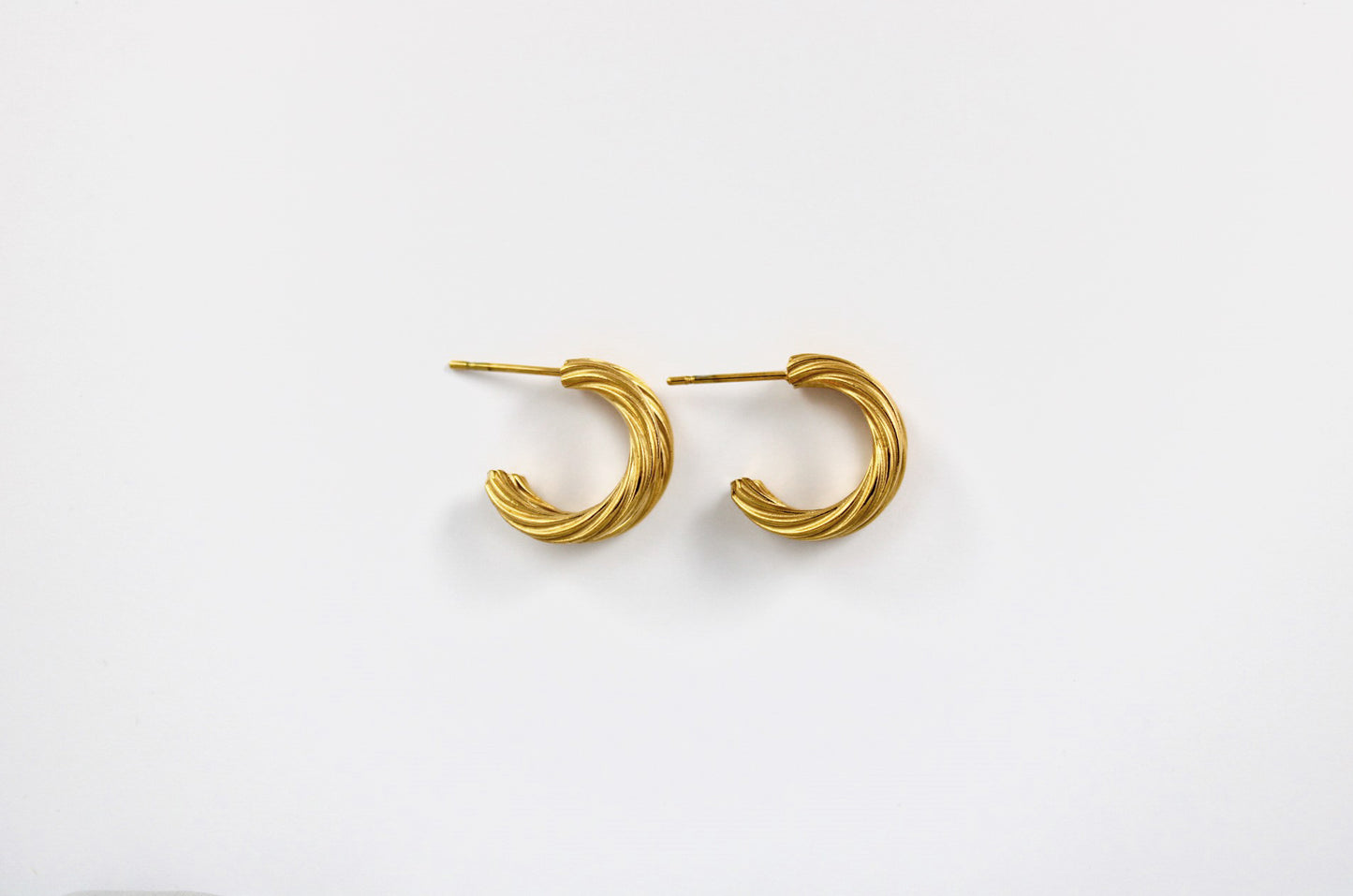 Double twist hoop earrings